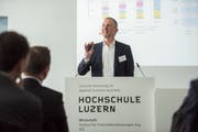 Thomas Ankenbrand während seines Referats an der «IFZ Fintech Konferenz» der Hochschule Luzern. (Bild: Dominik Wunderli, Zug)