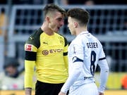 Hoffenheim mit Dennis Geiger (rechts) bietet dem BVB (im Bild Maximilian Philipp) nach Dreitore-Rückstand erfolgreich die Stirn (Bild: KEYSTONE/EPA/FRIEDEMANN VOGEL)