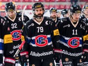 Enttäuschte Gesichter bei Gottéron: Die Freiburger erwachten gegen Genève-Servette zu spät (Bild: KEYSTONE/JEAN-CHRISTOPHE BOTT)