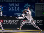 Max Heinzer (rechts) muss sich erst im Duell mit dem Italiener Andrea Santarelli geschlagen geben (Bild: KEYSTONE/EPA/ALEKSANDAR PLAVEVSKI)