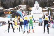 Dario Cologna (Mitte) in Siegerpose. (Bild: Ennio Leanza/Keystone, St. Moritz, 10. März 2019)