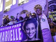 Frauen in Rio fordern bei einer Demonstration am Weltfrauentag «Gerechtigkeit für Marielle». (Bild: Keystone/AP/SILVIA IZQUIERDO)