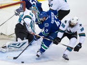Sven Bärtschi (Bildmitte) könnte bald wieder für die Vancouver Canucks auflaufen (Bild: KEYSTONE/AP The Canadian Press/DARRYL DYCK)