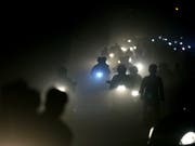 Smog in New Delhi - Umweltschäden führen laut einem Uno-Bericht zu massiven Gesundheitsproblemen. (Bild: KEYSTONE/AP/ALTAF QADRI)