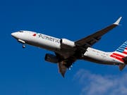 Ein Software Update soll verhindern, dass der Schub der Triebwerke der Unglücksmaschinen Boeing 737 Max 8 derart stark wird, dass sich die Maschine nicht mehr gerade ausrichten lässt. (Bild: KEYSTONE/EPA/JUSTIN LANE)