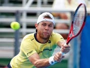 Radu Albot spielt am Samstag erstmals gegen Roger Federer (Bild: KEYSTONE/AP/WILFREDO LEE)