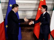 Schliessen sich Chinas umstrittener Seidenstrassen-Initiative an: Italiens Premierminister Giuseppe Conti begrüsst den chinesischen Präsidenten Xi Jinping. (Bild: KEYSTONE/AP/ANDREW MEDICHINI)