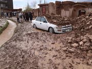 Verheerende Sturzfluten in Afghanistan fordern zahlreiche Todesopfer. (Bild: KEYSTONE/EPA/JALIL REZAYEE)