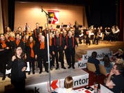 Die Gospel Singers Stans musizierten mit der Blasmusik Ennetmoos. (Bilder: Kurt Liembd, Ennetmoos, 30. März 2019)