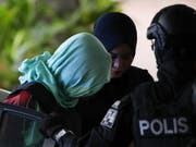 Die vermeintliche Attentäterin auf den Halbbruder des nordkoreanischen Diktators hat am Montag einen Deal mit der Staatsanwaltschaft in Malaysia geschlossen. (Bild: KEYSTONE/EPA/FAZRY ISMAIL)