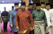 Hassanal Bolkiah, Sultan von Brunei (in rot). (Bild: EPA)