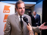 CVP-Präsident Gerhard Pfister sieht seine Partei im Aufwärtstrend, zeigt sich aber gleichzeitig selbstkritisch. Er bewertet seine Rolle mit der Note vier von zehn. (Bild: KEYSTONE/ANTHONY ANEX)