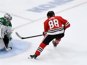 Patrick Kane (rechts) führt das US-Team an der zweiten WM in Folge als Captain an (Bild: KEYSTONE/FR170980 AP/MATT MARTON)