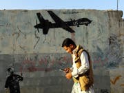 Protest-Graffiti in der jemenitischen Hauptstadt Sanaa gegen US-Drohnenangriffe. (Bild: KEYSTONE/EPA/YAHYA ARHAB)