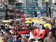 Zehntausende Menschen haben in Hongkong gegen die Regierung der chinesischen Sonderverwaltungsregion demonstriert. (Bild: KEYSTONE/EPA/KYLE LAM)