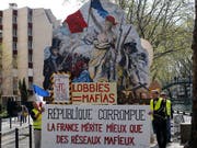 Das halten die Protestierenden in Paris vom Staat und der Regierung von Präsident Emmanuel Macron. (Bild: KEYSTONE/AP/RAFAEL YAGHOBZADEH)