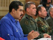 Nach dem Aufstand von Soldaten in Venezuela hat Präsident Nicolás Maduro (links) den Aufstand für gescheitert erklärt und dankte am Dienstagabend (Ortszeit) der Militärführung für den Mut «bei der Verteidigung des Friedens». (Bild: KEYSTONE/AP Miraflores Press Office)