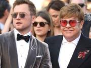 Der Schauspieler Taron Egerton (links) und der Sänger Elton John (rechts) zeigen sich am Donnerstag vor der Presse auf dem Filmfestival in Cannes. (Bild: KEYSTONE/AP Invision/VIANNEY LE CAER)