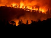 Resultat der Ermittlungen: Der verheerende Waldbrand in der nordkalifornischen Ortschaft Paradise mit 85 Todesopfern im November 2018 ist durch defekte Stromleitungen ausgelöst worden. (Bild: KEYSTONE/FR34727 AP/NOAH BERGER)