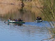 Migranten auf Gummibooten auf dem Rio Grande an der Grenze zwischen Mexiko und dem US-Bundessaat Texas. (Bild: KEYSTONE/EPA/LARRY W. SMITH)