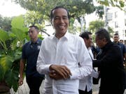 Jetzt ist es offiziell: Indonesiens Präsident Joko Widodo bleibt für fünf weitere Jahre im Amt. (Bild: KEYSTONE/AP/ACHMAD IBRAHIM)