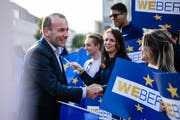 epa07590643 The CDU/CSU top candidate for the upcoming European Parliament Elections, European People's Party (EPP) chairman Manfred Weber, shakes hands with supporters as he arrives for a television debate in Berlin, Germany, 21 May 2019. The European Parliament election will be held in Germany on 26 May 2019. EPA/CLEMENS BILAN
