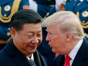 Chinas Präsident Xi Jinping und US-Präsident Donald Trump. (Bild: KEYSTONE/AP/ANDY WONG)