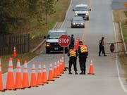 Der 19-jährige Autofahrer machte sich vor einer Polizeikontrolle aus dem Staub. (Bild: KEYSTONE/EPA/MICHAEL REYNOLDS)