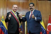Der türkische Präsident Erdogan (links) mit dem venezolanischen Präsidenten Nicolas Maduro. (Bild: Cem Oksuz/Getty, Caracas, 3. Dezember 2018)
