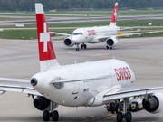 Kapazitätsengpässe an den Flughäfen Genf und Zürich belasten die künftige Entwicklung der Schweizer Zivilluftfahrt. (Bild: KEYSTONE/CHRISTIAN MERZ)