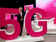 Die Spitze der Deutschen Telekom zeigt sich zufrieden mit der Entwicklung des Konzerns. (Bild: KEYSTONE/DPA/OLIVER BERG)
