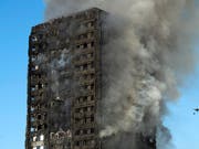 Bei dem Feuer am 14. Juni 2017 im Grenfell Tower waren 71 Menschen ums Leben gekommen. (Bild: KEYSTONE/EPA/WILL OLIVER)