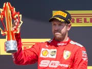 Sebastian Vettels säuerliche Miene auf dem Podest in Montreal (Bild: KEYSTONE/AP The Canadian Press/PAUL CHIASSON)
