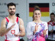 Oliver Hegi bei den Männern und Ilaria Käslin bei den Frauen heissen am Eidgenössischen Turnfest in Aarau die Sieger im Kunstturnen (Bild: KEYSTONE/CHRISTIAN MERZ)