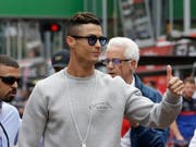 Der portugiesische Fussballstar Christiano Ronaldo wird wegen eines Vergewaltigungsvorwurfs vor ein US-Gericht zitiert. (Bild: KEYSTONE/AP/LUCA BRUNO)