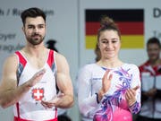 Oliver Hegi bei den Männern und Ilaria Käslin bei den Frauen heissen am Eidgenössischen Turnfest in Aarau die Sieger im Kunstturnen. (Bild: Christian Merz/Keystone)