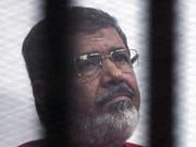 Starb am Montag bei einem Auftritt vor Gericht: der frühere ägyptische Präsident Mohammed Mursi. (Bild: KEYSTONE/EPA/KHALED ELFIQI)