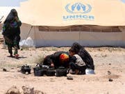 Die Zahl der Flüchtlinge ist einem Uno-Bericht zufolge im vergangenen Jahr auf ein Rekordhoch gestiegen. Ende 2018 gab es weltweit 70,8 Millionen Flüchtlinge, Vertriebene und Asylbewerber. (Bild: Keystone/EPA/JALIL REZAYEE)