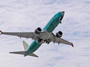 Eine Boeing-Maschine des Typs 737 Max 8 bei einem Testflug im Mai in Renton im US-Bundesstaat Washington. (Bild: KEYSTONE/AP/TED S. WARREN)