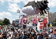 Hunderttausende Iraner protestierten gegen Trumps geplanten Nahost-Friedensplan. Bild: Abedin Taherkenareh/EPA (Teheran, 31. Mai 2019)