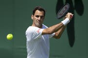 Federer beim Training in Wimbledon. (Bild: Keystone)