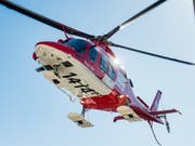 Die Rettungsmannschaft eines Helikopters der Rega konnte nur noch den Tod der beiden Flugzeug-Insassen feststellen. (Bild: KEYSTONE/TI-PRESS/GABRIELE PUTZU)