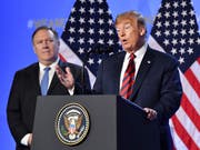 US-Aussenminister Mike Pompeo (links) und Präsident Donald Trump (rechts) haben die Erfolgschancen ihres lange angekündigten, aber bisher unveröffentlichten Nahost-Friedensplanes in Zweifel gezogen. (Bild: KEYSTONE/AP/GEERT VANDEN WIJNGAERT)