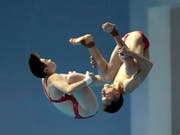 Die Chinesen Lian Junjie und Si Yajie im Mixed-Synchron-Wettbewerb (Bild: KEYSTONE/AP/LEE JIN-MAN)