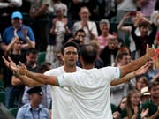 Die Erlösung nach einem epischen Final: Juan Sebastian Cabal (re.) und Robert Farah jubeln in Wimbledon über ihren ersten Grand-Slam-Titel (Bild: KEYSTONE/EPA/NIC BOTHMA)