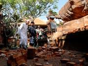 Das jüngste Erdbeben vor der indonesischen Ferieninsel Bali führte unter anderem zu Schäden an einem Tempel. (Bild: KEYSTONE/AP/FIRDIA LISNAWATI)