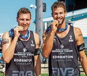 Biss ins Gold: Nico Beeler (links) und Marco Krattiger. (Bild: FIVB)