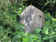 Erinnerungsstück: Der Mahlstein der ehemaligen Mühle.