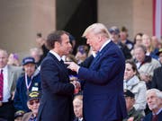 US-Präsident Donald Trump attackiert Frankreichs Präsident Emmanuel Macron wegen der Einführung einer neuen Steuer in Frankreich und kündigte unter anderem Strafzölle auf den Import französischer Weine an. (Bild: KEYSTONE/AP/ALEX BRANDON)