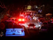 Polizei und Rettungskräfte sind nach einem Schusswaffenangriff auf einem Festival in Kalifornien im Einsatz. (Bild: KEYSTONE/AP San Jose Mercury News/NHAT V. MEYER)